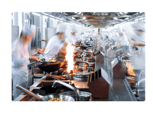 Busy commercial kitchen during service