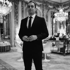 Elegant man in a grand room